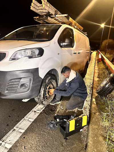 TT Mobile Tyre Fitting — tyre fitting on a van on motorway hard shoulder at night